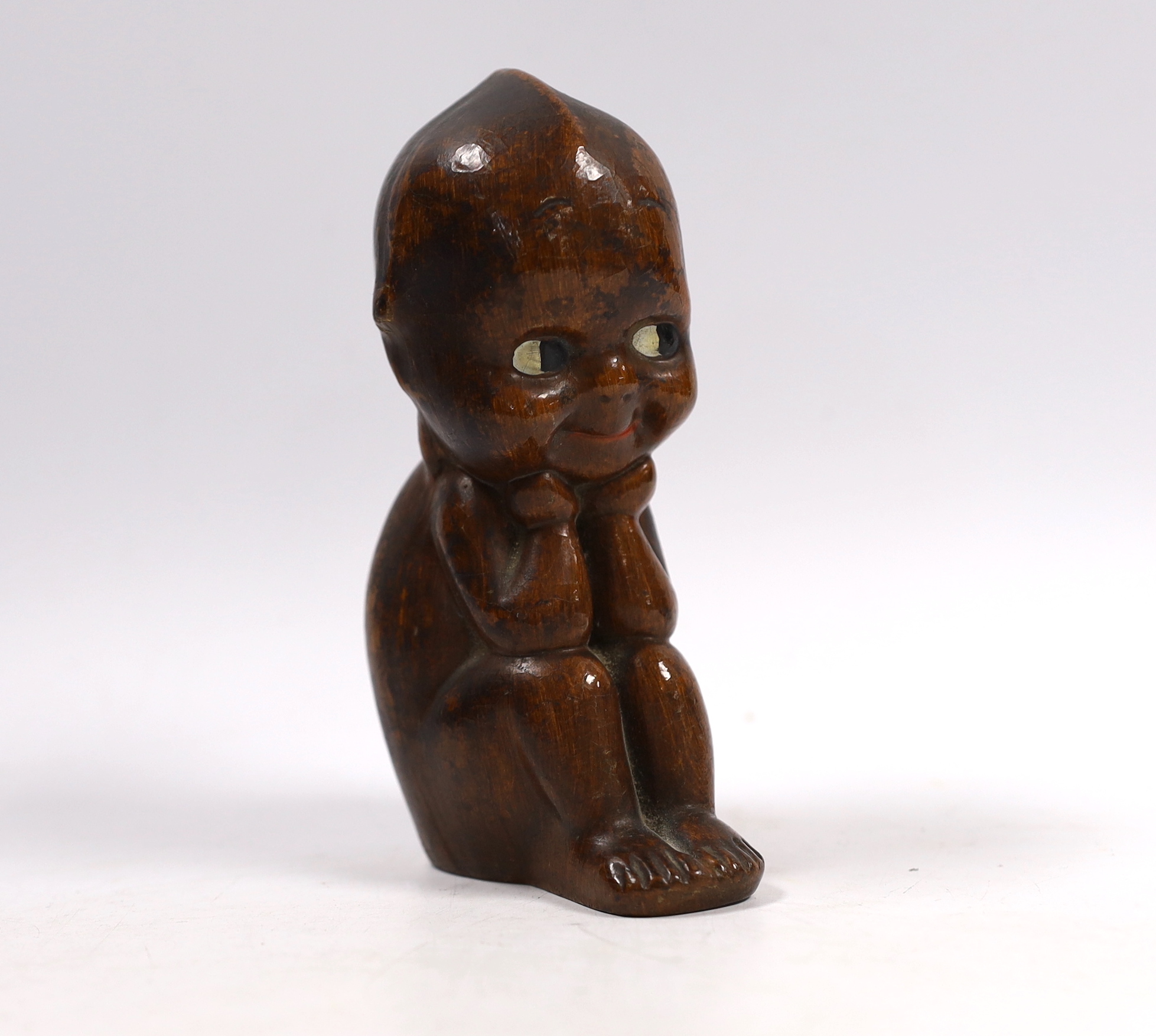 A Kewpie composition figure with painted eyes, 14cm high